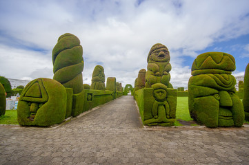 TULCAN, ECUADOR - JULY 3, 2016: cemetery path between the topiary gardens