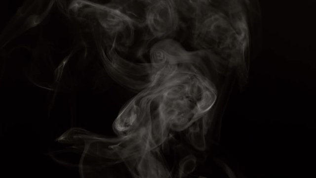 Steam on black background in slow motion, shot with Phantom Flex 4K at 1000 frames per second