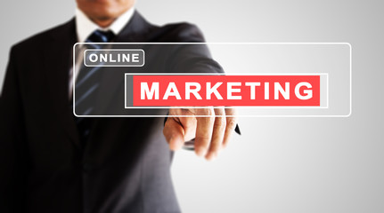 Businessman hand pressing on online marketing screen