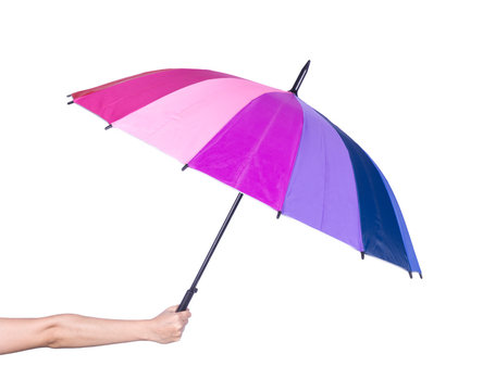 hand holding multicolored umbrella isolated on white