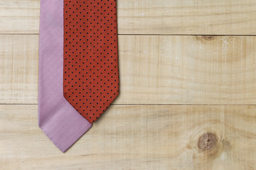 Obraz premium Necktie on wood background, Father's day concept idea background