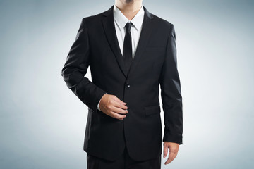 Photo of stylish man in elegant black suit  , with clipping path