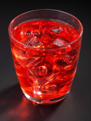 El Presidente isolated on black background. Made from 2 oz rum,