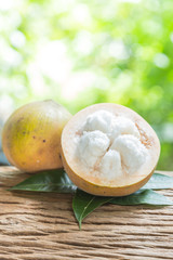 Santol fruit on wood