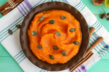 Organic pumpkin puree in a bowl. Dietary dish. The top view