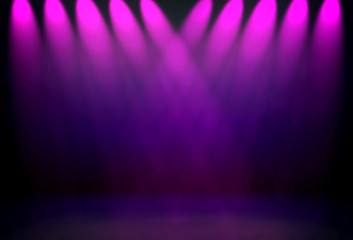 empty stage with purple spotlight background