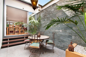 back yard with outdoor seating and barbecue with family