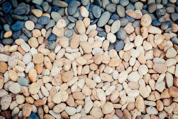 white ,gray ,orange pebbles background