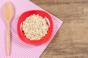 oats in plate on wood table