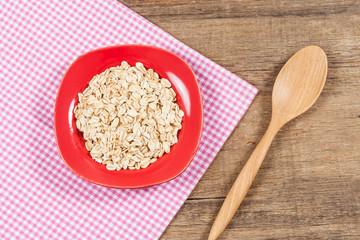 oats in plate on wood table