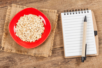 oats in plate on wood table