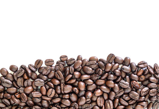 Coffee beans heap below on white background