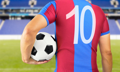 soccer football player in blue and red team