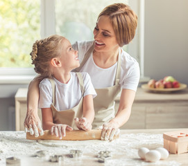 Mother and daughter baking