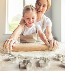 Mother and daughter baking