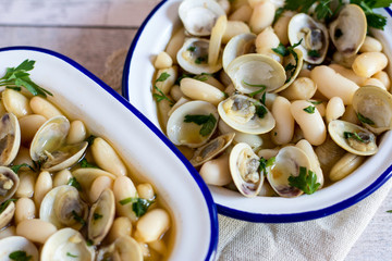Two plates of oysters with gnocchi