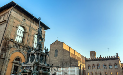 Fototapeta na wymiar Neptune Statue and Basilica di San Petronio in Bologna, Italy