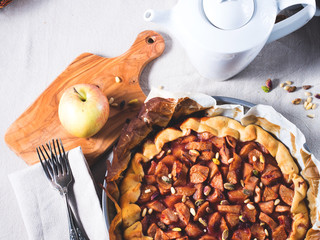 Apple galette with pine and pistachio nuts