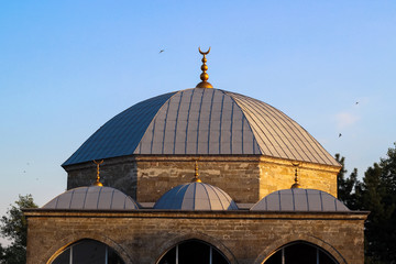 Roof of the old mosque at sunset. Ukraine