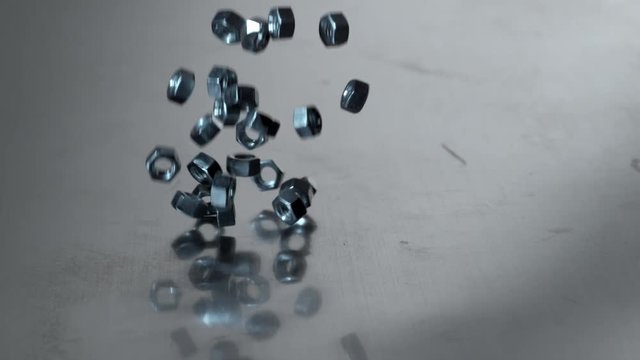 Metal nuts falling onto metal surface, shot with Phantom Flex 4K at 1000 frames per second
