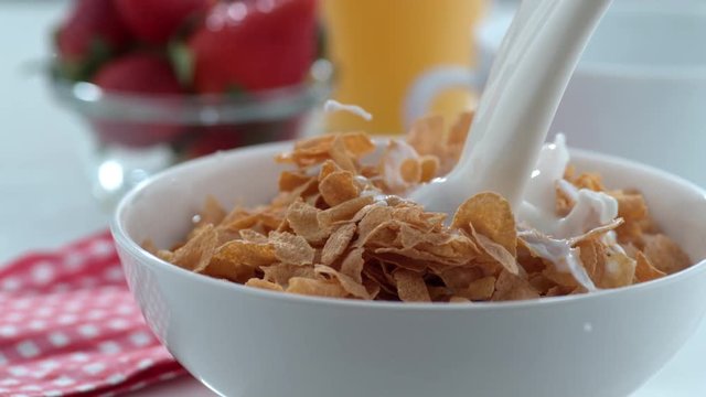 Milk pouring into cereal bowl in slow motion; shot on Phantom Flex 4K at 1000 fps
