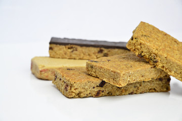 Snack protein raisin bar isolated on white