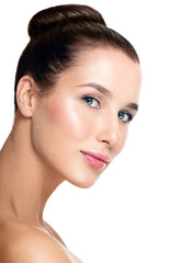 Fototapeta premium Beautiful face of young adult woman with clean fresh skin.