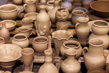 Fototapeta na wymiar a lot of pottery on the table 