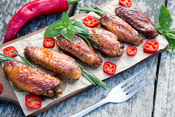 Baked spicy chicken wings in the Asian style