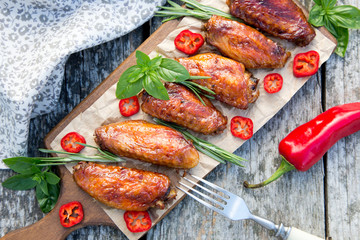 Baked spicy chicken wings in the Asian style