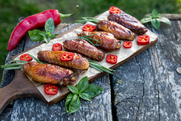 Baked spicy chicken wings in the Asian style