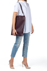 Naklejka premium Woman holding a handbag isolated on white background