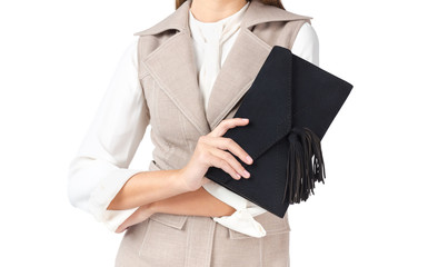 Woman holding a handbag isolated on white background