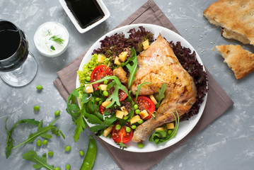 Baked chicken with a salad