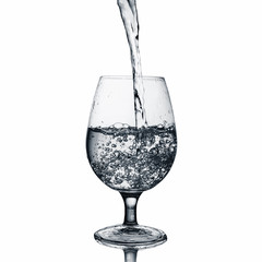 Monochrome Water splashes in the glass isolated on white