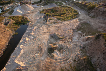 Fototapeta na wymiar Aerial view of a gravel and sand quarry 