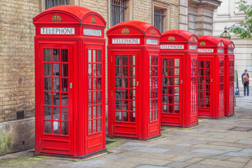 Famous red telephone booths in Covent Garden street, London, England