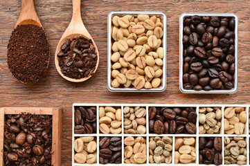 different coffee forms in wooden box and ground coffee in wooden spoon