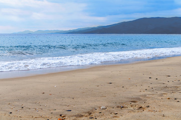 Ocean wave close and sand beach
