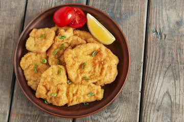 roasted schnitzel chop escalope with lemon tomato rice
