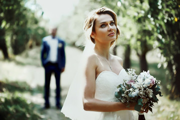 Beautiful couple of happy stylish newlyweds