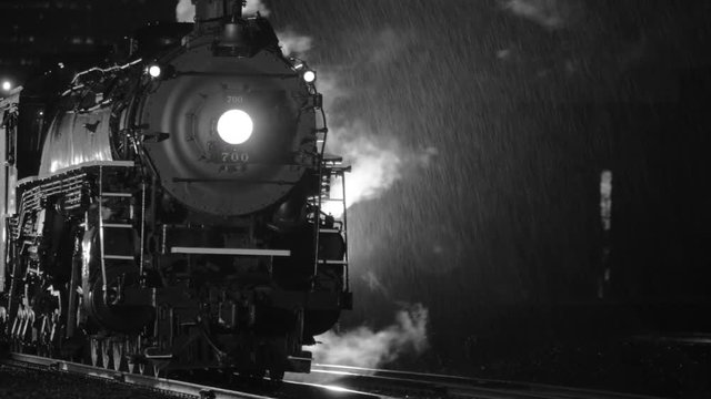Steam locomotive at night  in black and white