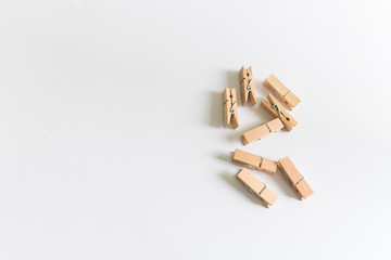 Wood clothespins isolated background