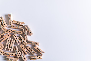 Wood clothespins isolated background