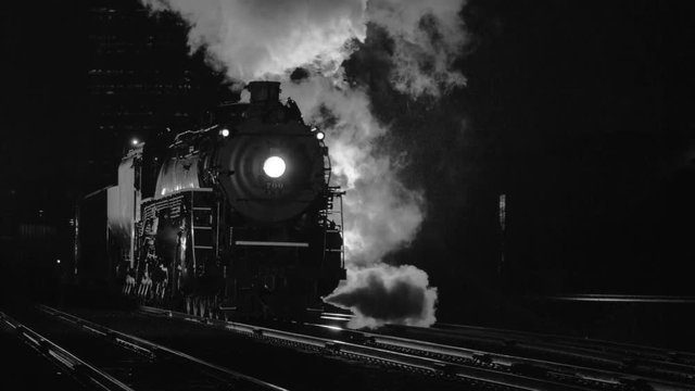 Steam locomotive at night  in black and white