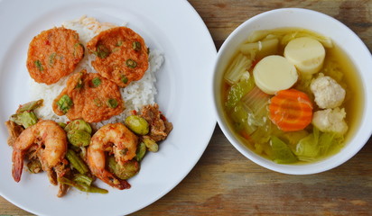 fried fish cake and spicy stir fried bitter flat bean with shrimp and soup