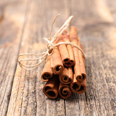 cinnamon on wooden background