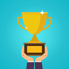 Hands holding winner's cups. Symbol of success, winning, champio