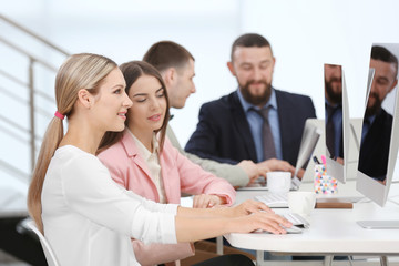People working on computers at a office