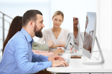 People working on computers at a office